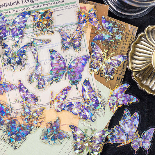 Purple holographic butterfly stickers spread on vintage paper