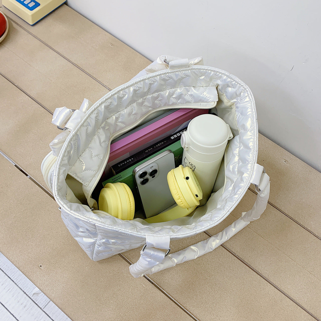 Ita tote bag interior with phone and essentials inside