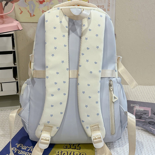 Back panel of blue star heart ita backpack with straps
