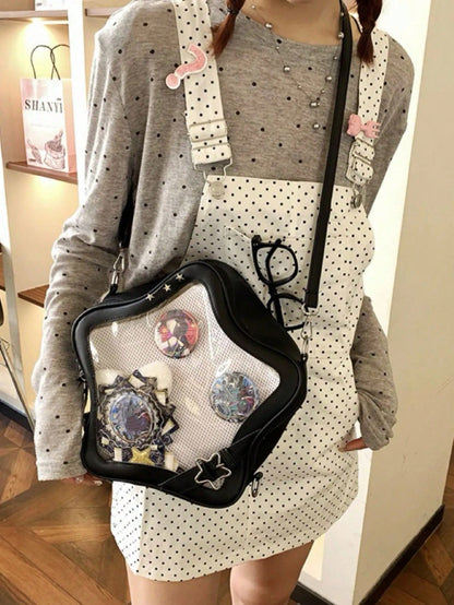 Black star ita bag with anime character pin display