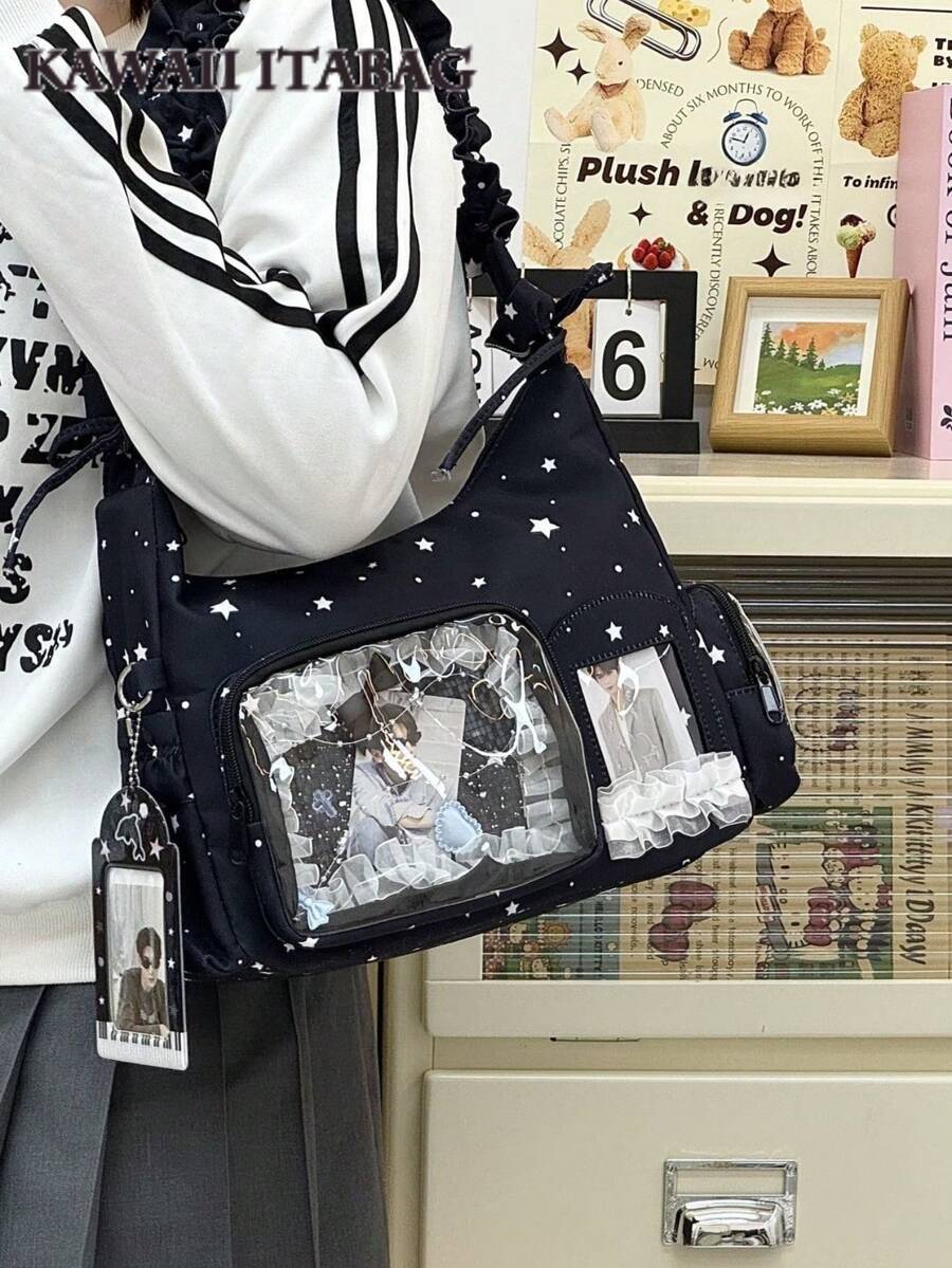 Black star ita bag with clear display window held on shoulder