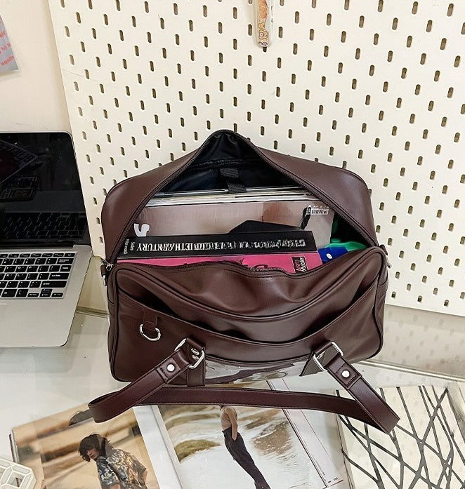 JK ita bag loaded with laptop A4 books and accessories showing full interior capacity