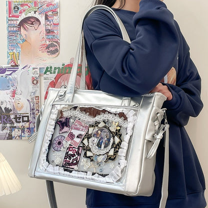silver metallic ita bag with white lace trim clear display window worn as shoulder tote anime style