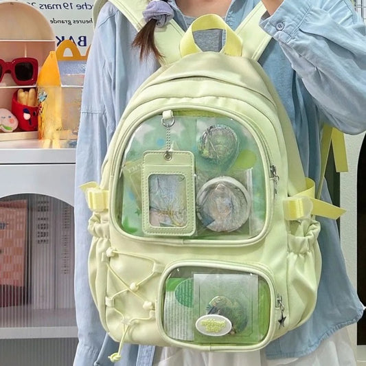 Girl wearing pastel green kawaii ita backpack front view