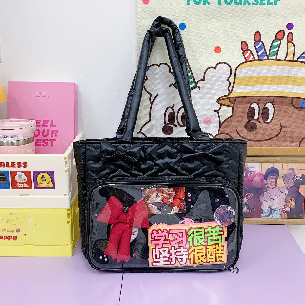 Black quilted ita tote with transparent front pocket