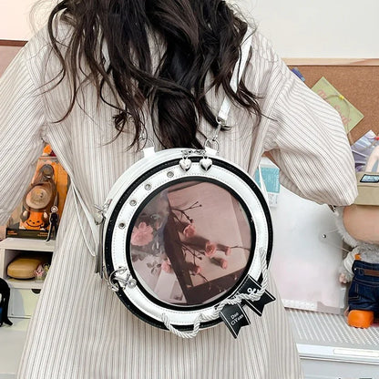 circle ita bag white and black clear window crossbody with rope anchor detail worn back view