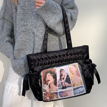 black satin ita bag tote with ruffle trim bow detail and clear display window kpop merch