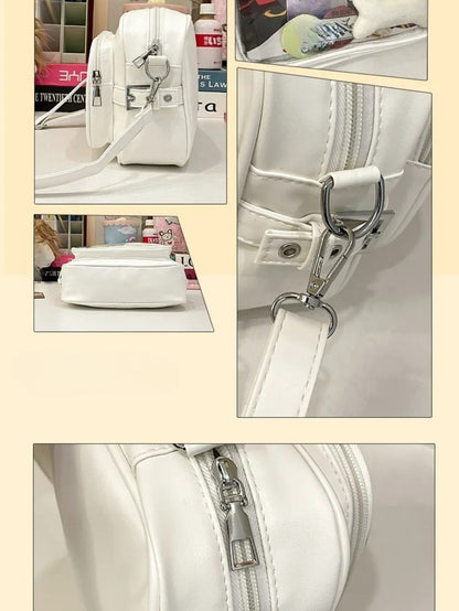 Y2K ita bag silver hardware D-ring side detail and dual zip close-up white colourway