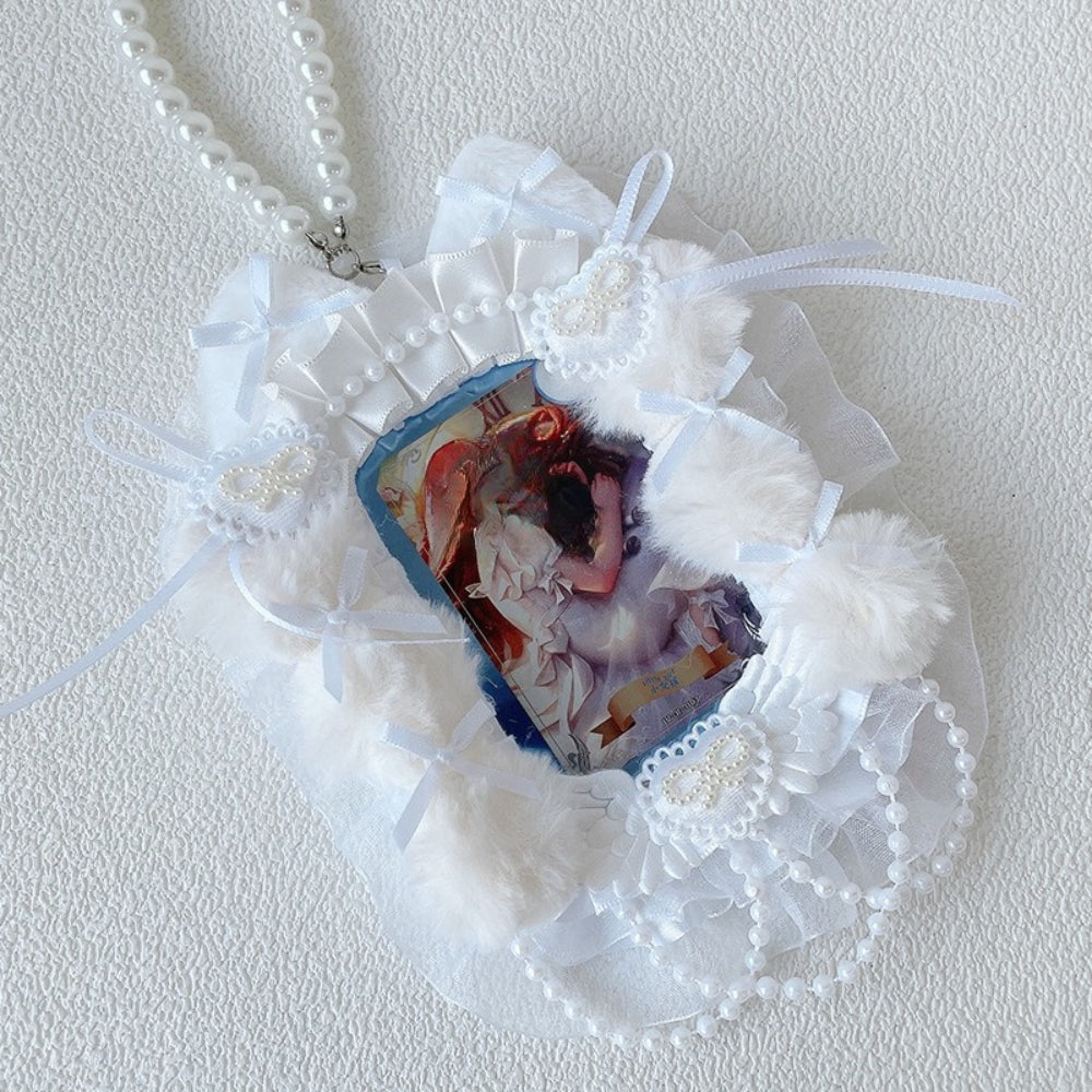 White all-lace faux fur ita necklace displaying angel character card