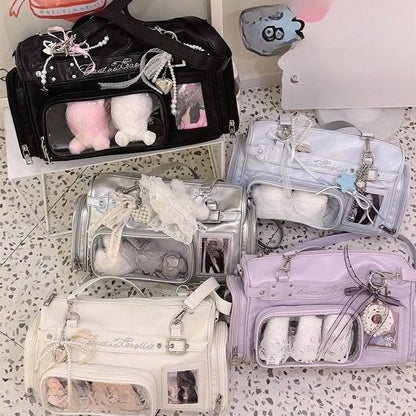 Six colourways of transparent display Boston bags arranged