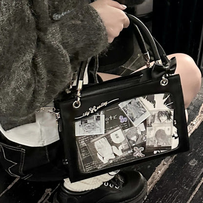 Black ita display handbag held by person showing manga collage window