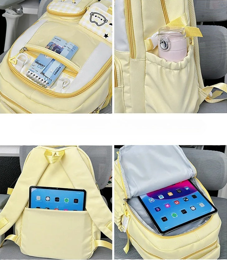 Yellow Miusi backpack interior showing tablet sleeve and side pocket