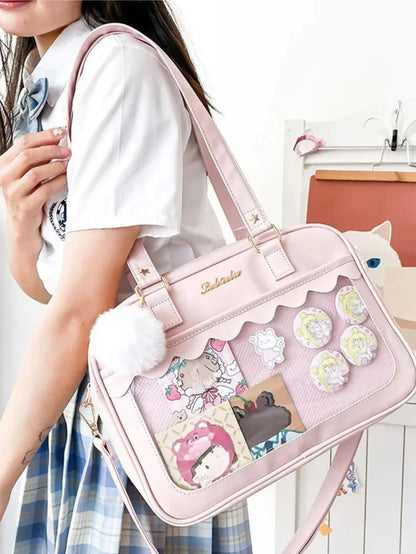 kawaii scallop edge ita bag pink PU leather clear mesh display window with pins and pom pom charm shoulder carry