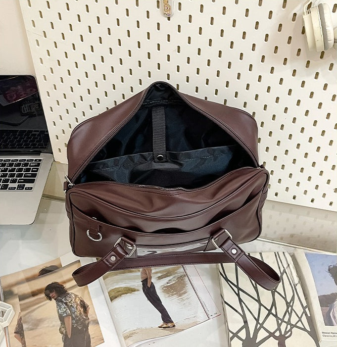 JK boston ita bag interior open view showing capacity and internal compartments dark brown