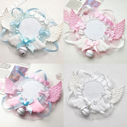 Four angel wing badge holders in blue, pink, white colourways