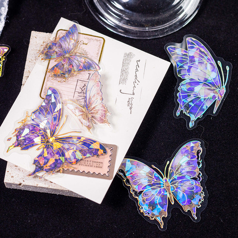  Blue and purple butterfly stickers on postcards and black velvet