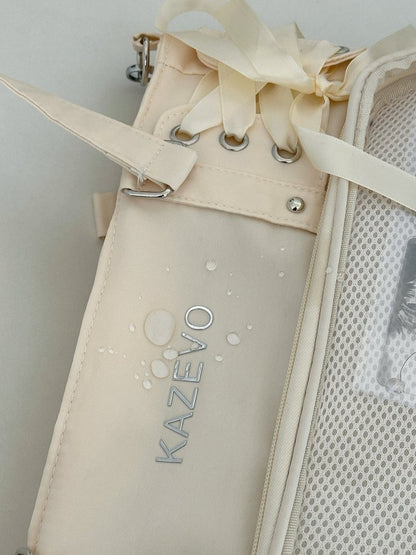 lace-up ita bag water-resistant nylon side detail with ribbon lacing and silver grommets