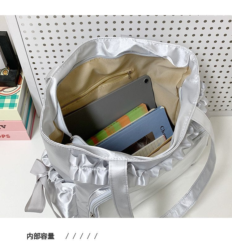 lolita ita bag interior capacity showing tablet and notebooks fitting with display window visible