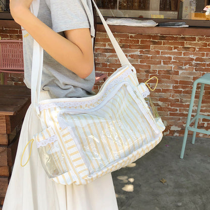 Yellow stripe clear PVC ita shoulder bag worn outdoors