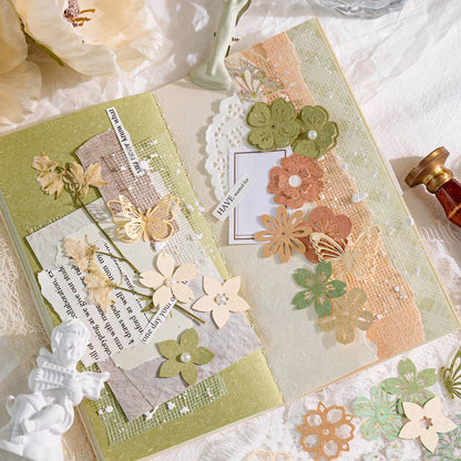 Sage green scrapbook journal page with layered paper die cut flowers