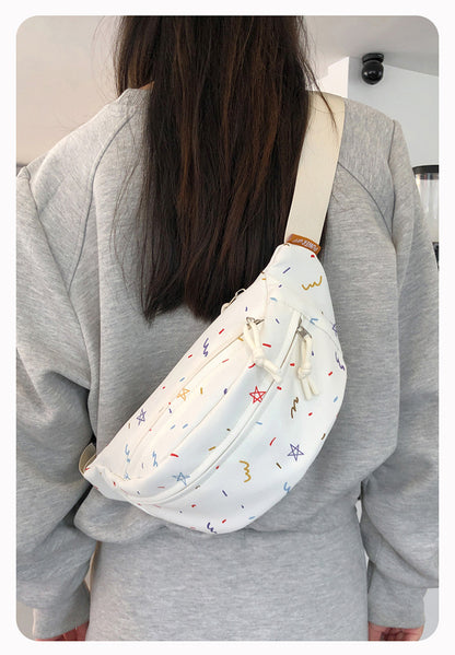 White confetti chest bag worn on back crossbody style