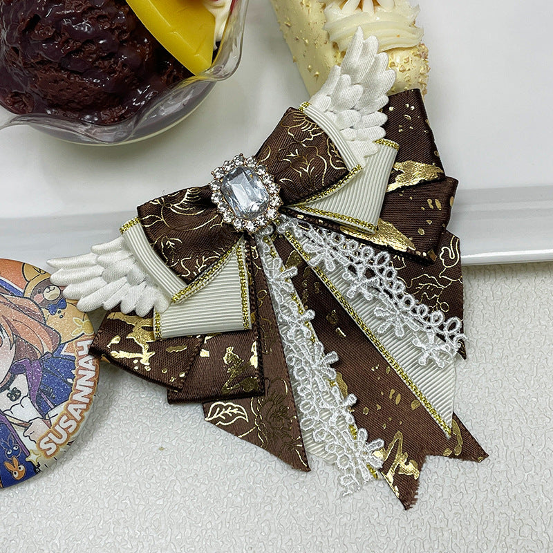 Angel Wing Bow Brooch Hair Clip with Rhinestone Centre, Lace Trim & Gold Foil Ribbon — 6 Colours