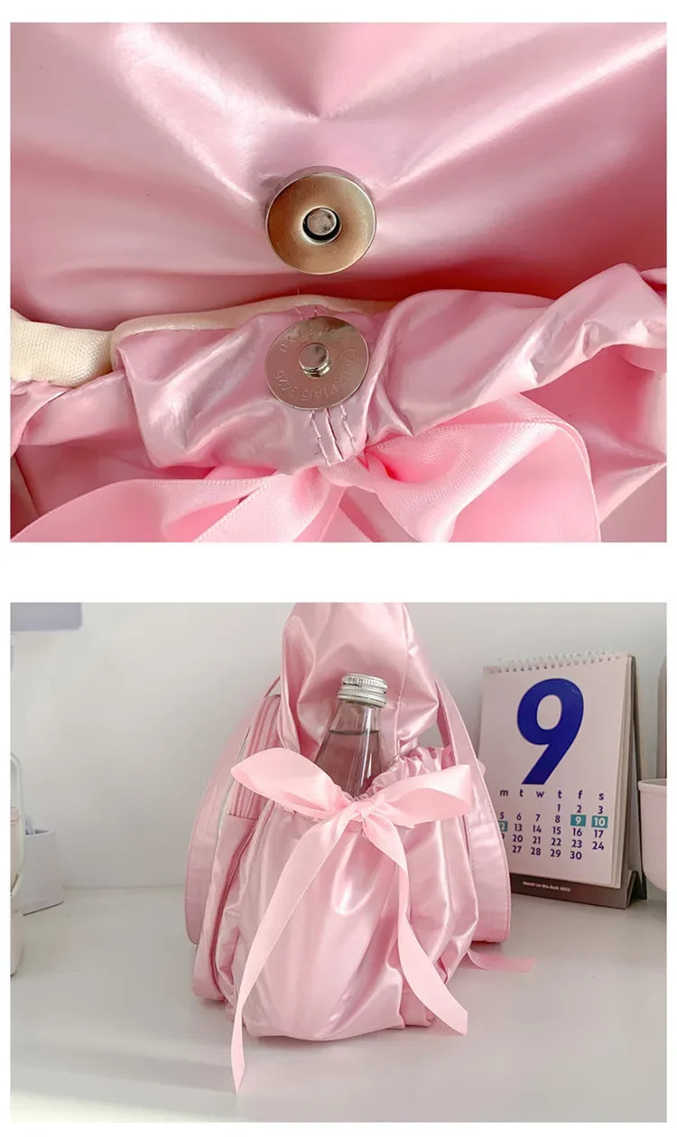 Side view of the ribbon ita bag showing a water bottle inside the spacious compartment and the magnetic snap closure on the side bow pocket.