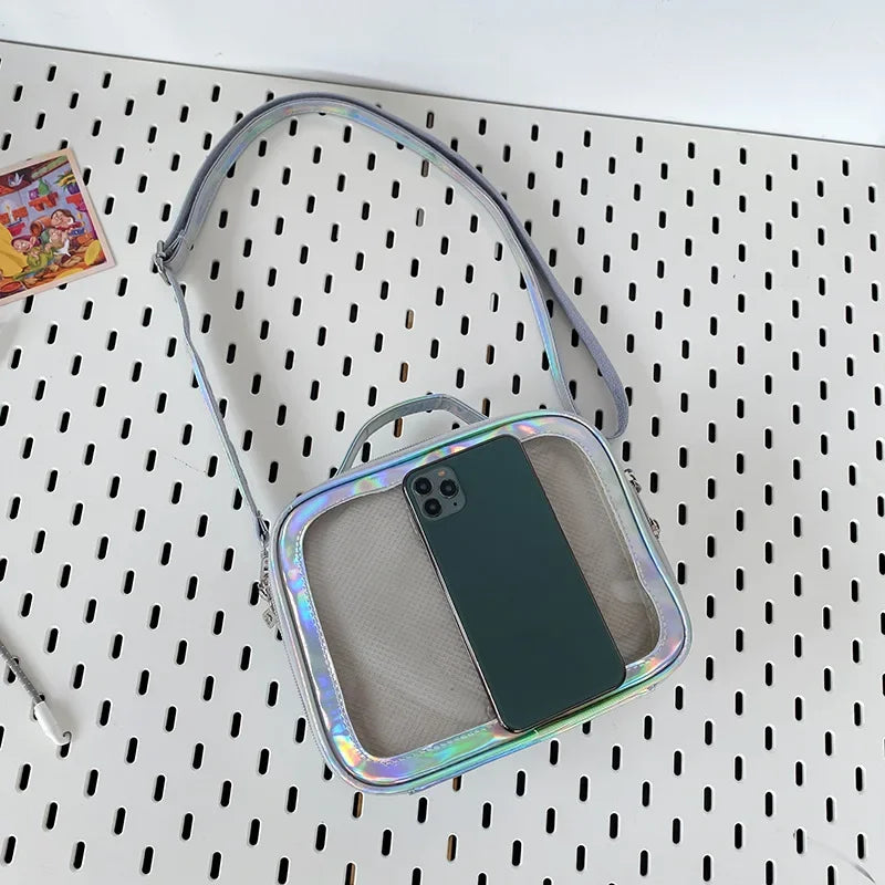 holographic mini ita bag silver flat lay with phone size comparison clear mesh display window
