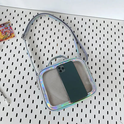 holographic mini ita bag silver flat lay with phone size comparison clear mesh display window