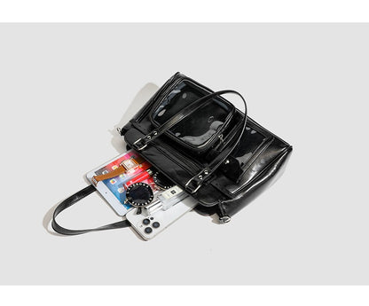 large capacity vintage ita bag interior showing tablet phone badge and accessories fitting together