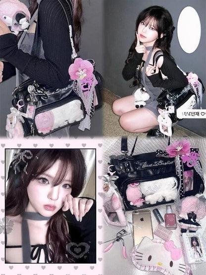 Model wearing black Boston ita bag with pink accessories