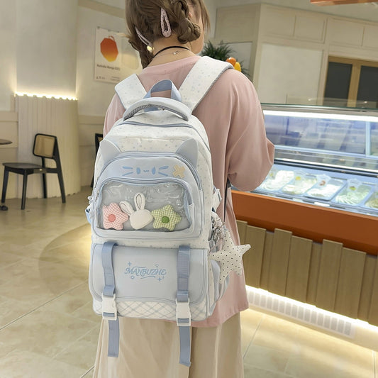 Blue cat ear ita backpack worn at dessert café, rear view