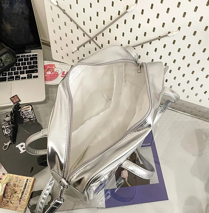 large ita bag silver interior empty showing internal divider and spacious main compartment