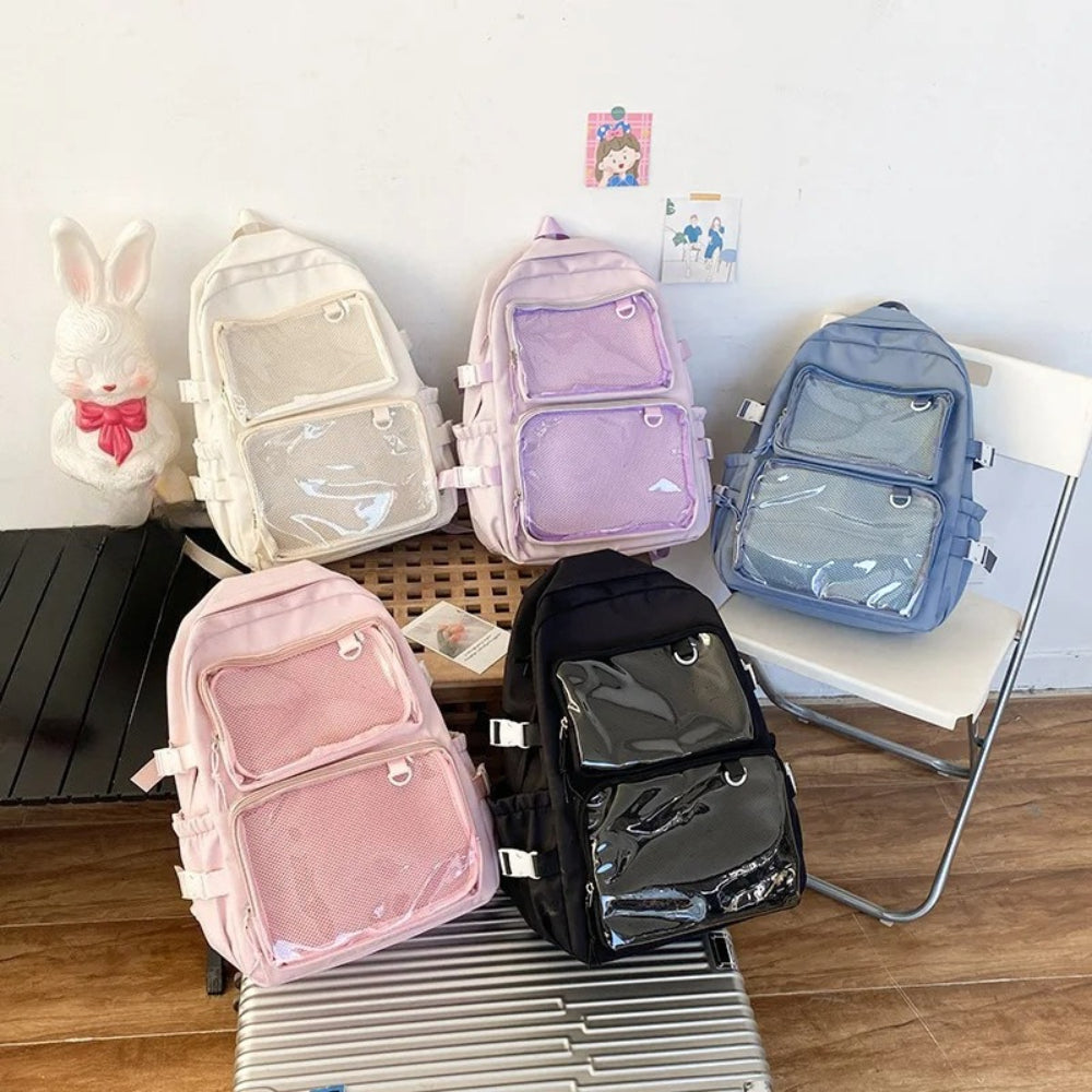 ita backpack 5 colour options cream pink lilac blue grey black clear window display