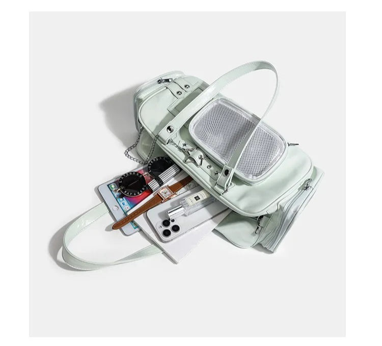 large star ita bag capacity showing two phones tablet watch and accessories fitting inside